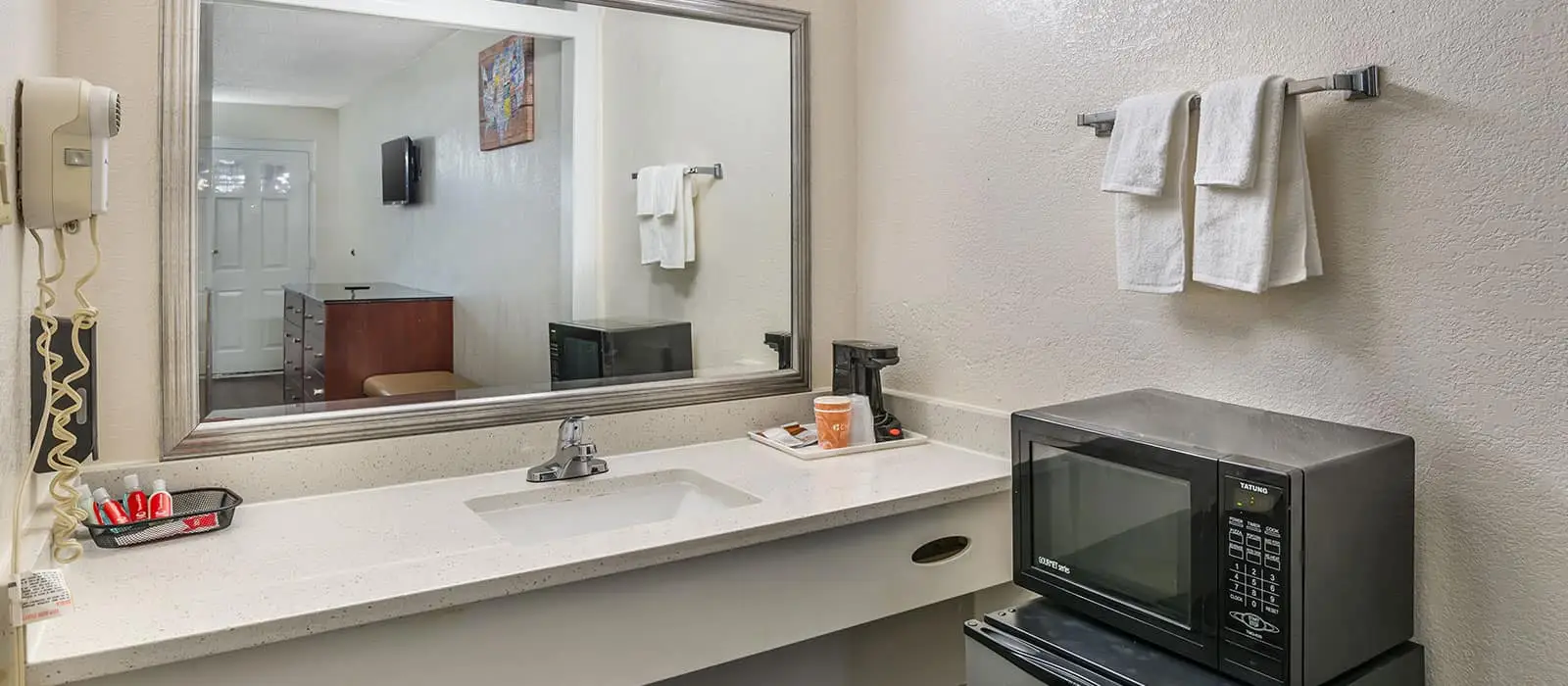 Econo Lodge Inn & Suites Richmond, Virginia — View 6 of our comfortable hotel rooms, amenities, and exterior